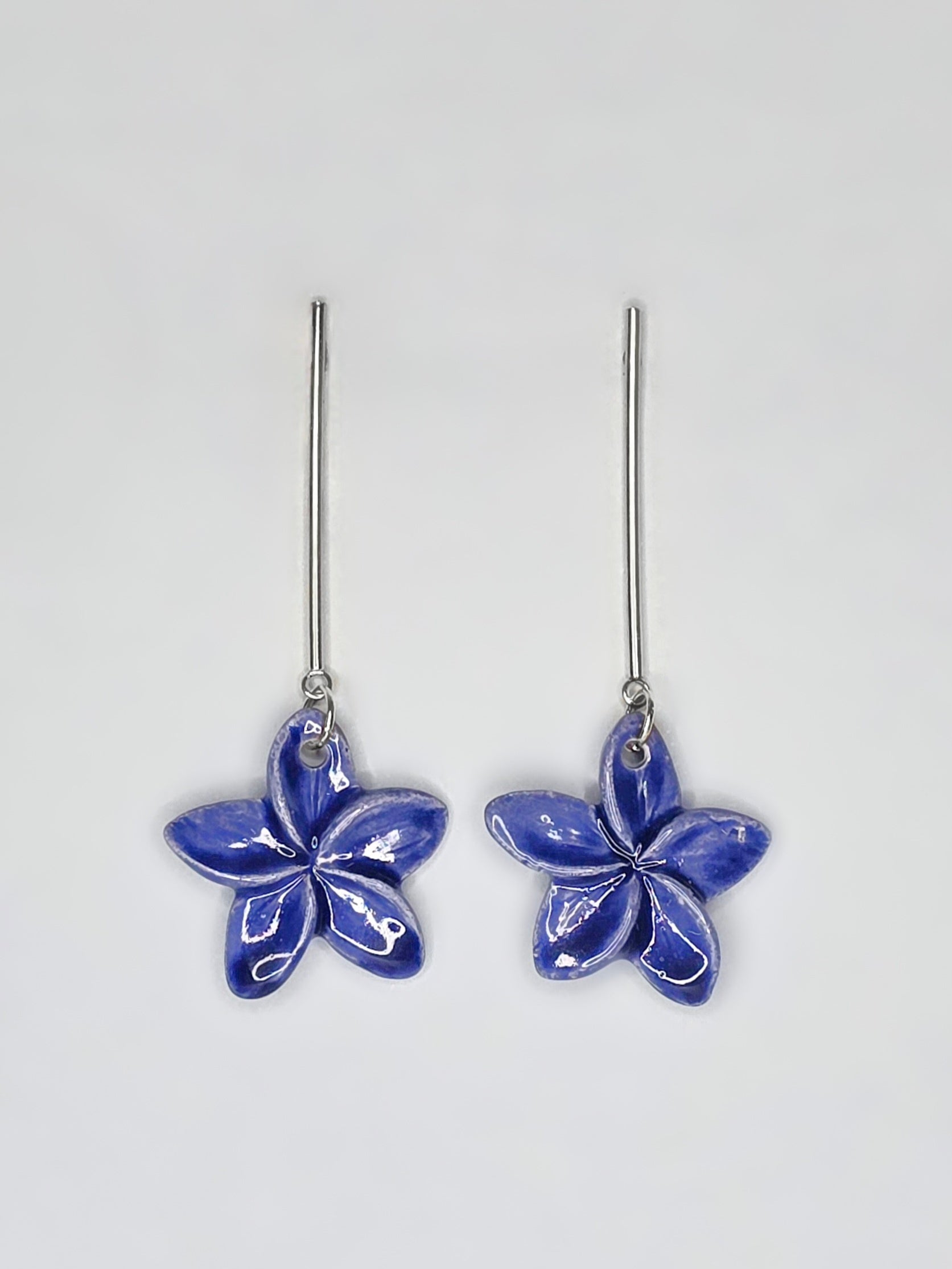 PENDIENTES PLUMERIA